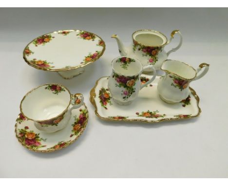 A Royal Albert Old Country Roses tea service and part-dinner service , to include teapot , sugar , cream, oblong sandwich pla