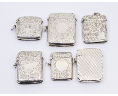 A collection of six Victorian or 20th century silver vesta cases to include; a Victorian Birmingham silver vesta of ribbed fo