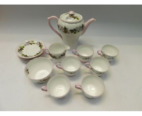 A1950s Shelley six piece tea service with pot, sugar and cream jug.