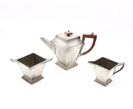 Arts and Crafts early 20th Century three piece pewter hammered tea service, Sheffield pewter.