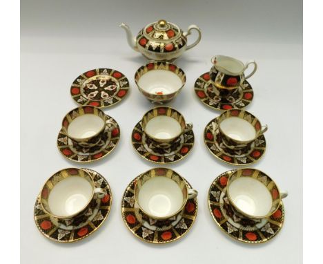 An Abbeydale part-tea service: 6 cups and saucers, 2 side plates, teapot, milk and sugar.