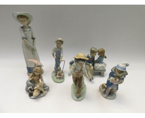 A collection of Lladro to include: Friday's Child 6019; Monday's Child 6012; Saturday's Child 6021 together three Nao figures