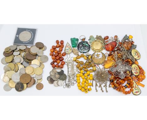 A collection of mixed costume jewellery, including a collection of various amber jewellery including pendants and bead neckla