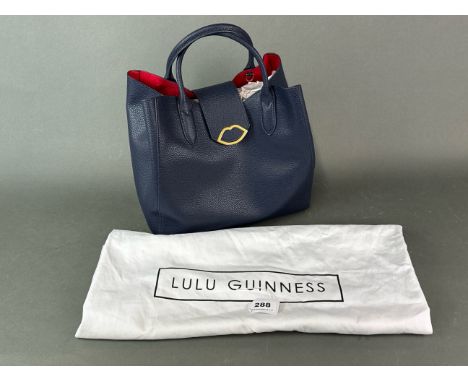 A Luella leather tote bag in a navy pebble leather by Lulu Guinness, H. 37cm. W. 30cm.