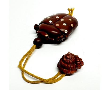 A Japanese carved fruitwood inro of a ladybird inset with mother of pearl with a shell netsuke and ball ogena, inro size 9cm.