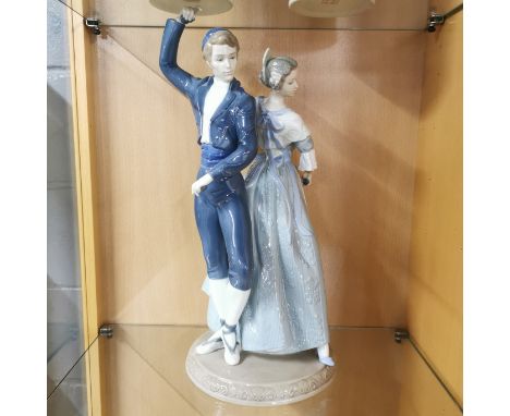 A large Nao porcelain figure of a couple dancing, H. 40cm.