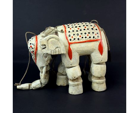 A mid-20th C. Indian carved wooden elephant puppet, H. 17cm.