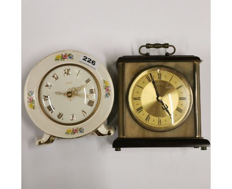 A 1960's Smiths porcelain mechanical clock, Dia. 16cm. Together with a Metamec mantle clock.