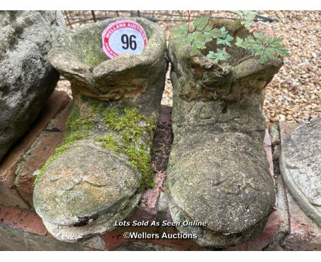 Two reconstituted stone boot planter, 15cm (h) x 40cm (l) / Please bring equipment and labour to assist with removal of all l