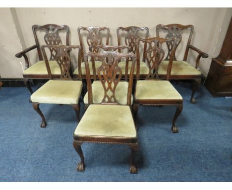 A SET OF EIGHT ANTIQUE CHIPPENDALE STYLE DINING CHAIRS, with pierced splats, raised on cabriole supports, with ball and claw 