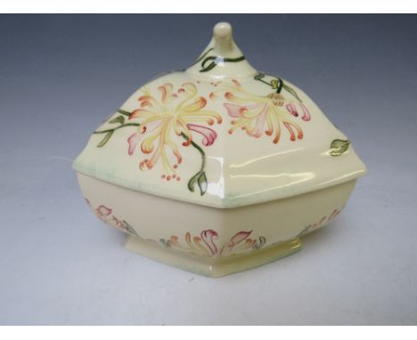 A COBRIDGE TRIAL TUREEN AND LID, decorated with a floral pattern, impressed factory mark, signed K. Goodwin, W 18 cm