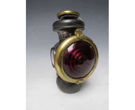 A VINTAGE MODEL T FORD REAR TAIL LAMP