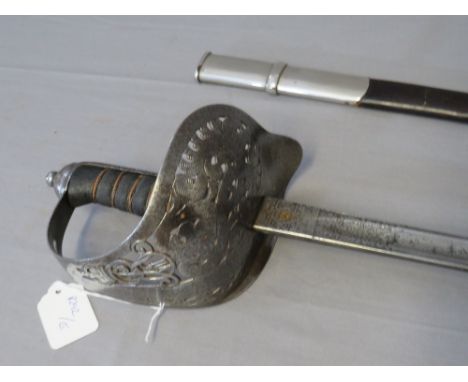 AN EDWARD VII INFANTRY OFFICERS SWORD, with solid hilt with ER VII cypher, the blade engraved with same cypher, in part leath