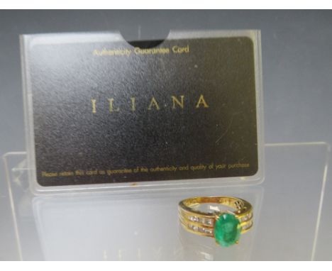 AN 18CT GOLD 'ILIANA' EMERALD RING, with diamond set shoulders, the certificate states it is a Columbian emerald. approx weig