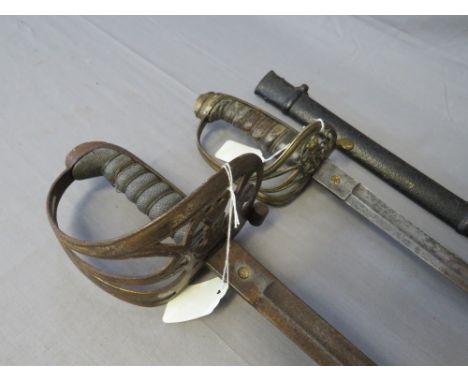 A VICTORIAN 1845 PATTERN INFANTRY OFFICERS SWORD, with slightly curved single edge blade, VR cypher to brass hilt, in steel s