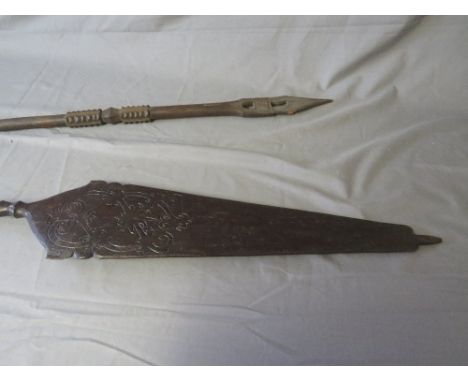 A LARGE INDONESIAN DAYAK BORNEO CARVED CANOE PADDLE, and a West African Benin tribal paddle (2) 