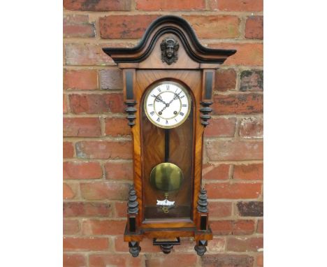 A MAHOGANY CASED VIENNA GONG STRIKE WALL CLOCK, having an 8 day German movement and white enamel dial, H 87 cm