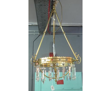 Hanging brass ceiling light with pierced and shaped decoration and hanging glass lustres. (B.P. 24% incl. VAT)Condition: Some