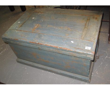 Rustic painted pine trunk of rectangular form with rope handles. (B.P. 24% incl. VAT) 