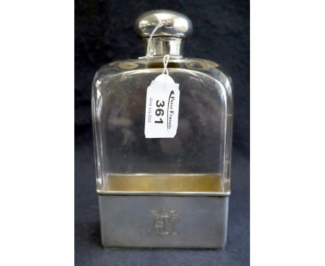 Large Victorian silver mounted glass flask with screw cap. London hallmarks for 1887. Engraved initials to the base mount. 18