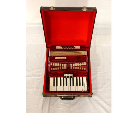 VINTAGE 'DIBORA' THIRTY-TWO BUTTON ACCORDION
of East German manufacture, with carrying case