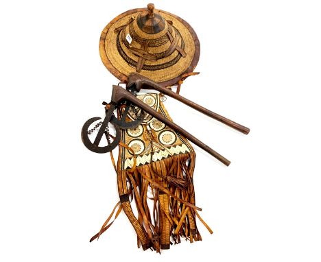 A group of leather and woven tribal items with two animal head axes, hat Dia. 42cm, axe L. 49cm.
