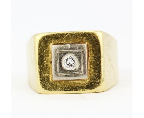 A heavy gent's 18ct yellow and white gold (stamped 18K) diamond set signet ring, (S). Approx. 12gr.&nbsp;