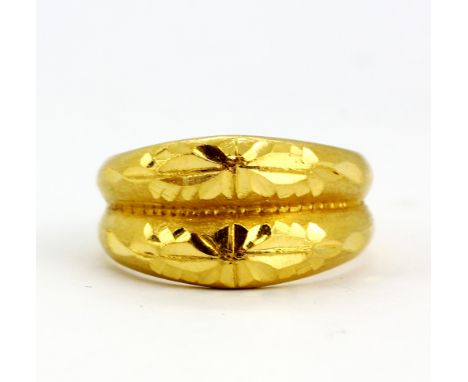 A heavy high carat yellow gold ring, stamped 998(N.5), approx. 11.4gr.&nbsp;