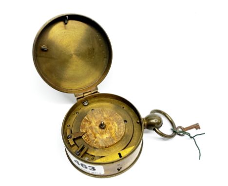 A brass watchman's clock, Dia. 9cm.