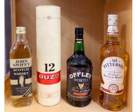 Two bottles of whiskey, a bottle of Offley ruby port and a bottle Ouzo.