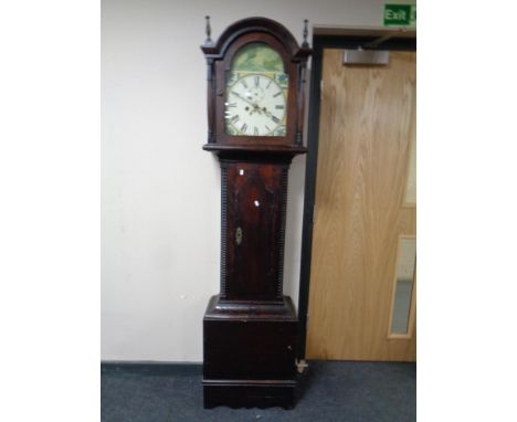 A 19th century pitch pine longcase clock with painted dial. 