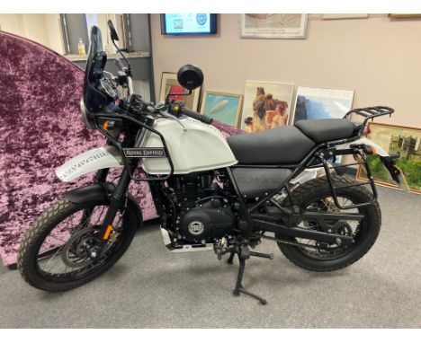 A Royal Enfield Himalayan motorcycle, 411 cc, Registration YE69 MXT, date of first registration 21.2.20, colour white, 3 form