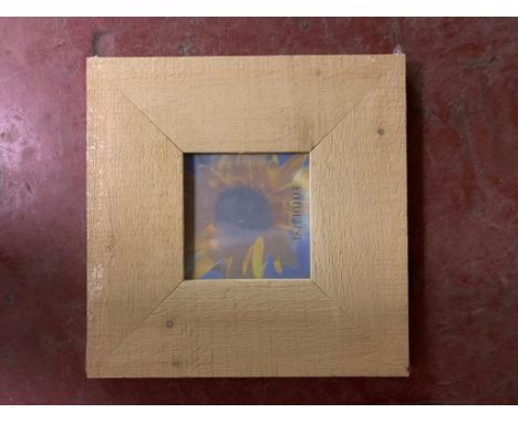 Three crates containing a total of 30 Fotolijst light wood finish photo frames, 10 cm x 10 cm, all brand new and still in ori