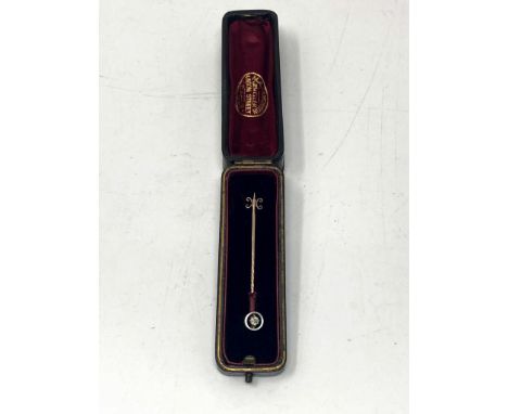 A vintage 9ct gold diamond tie pin 