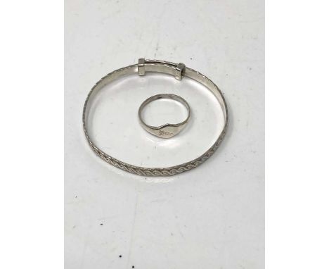 A silver child's ring and bangle 