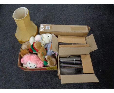 Two electric heaters, a box of soft toys, a brass table lamp, a TV stand in a box. 