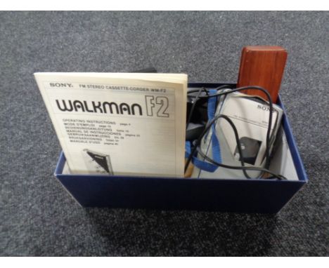 A vintage Sony stereo cassette player together with a Sony Walkman, letterman in case etc. 