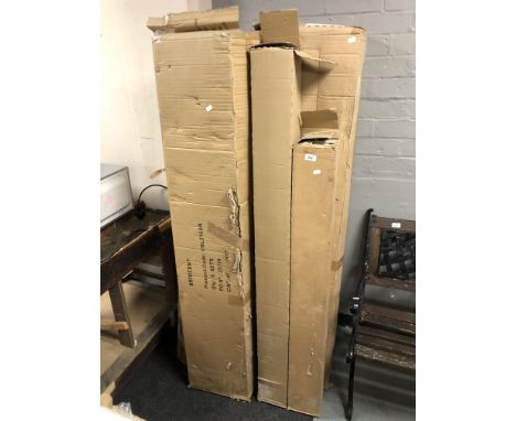 A quantity of boxed electrical light fittings and tubes. 