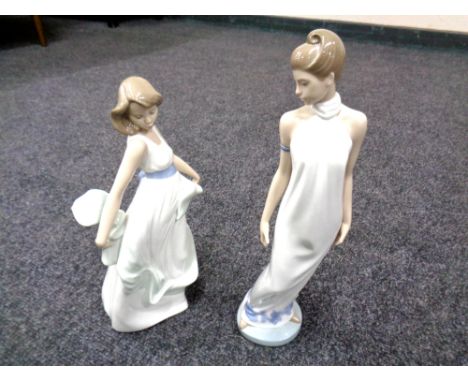 Two Nao figures of ladies.  