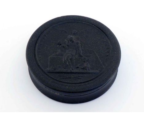 A French pressed tortoiseshell circular snuff box with pull-off cover depicting The Resurrection, early 19th century, featuri