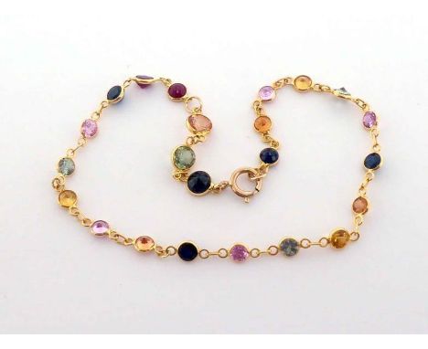 A dainty multigem bracelet, spectacle set along its length with various stones to include ruby and sapphire, to a bolt ring c