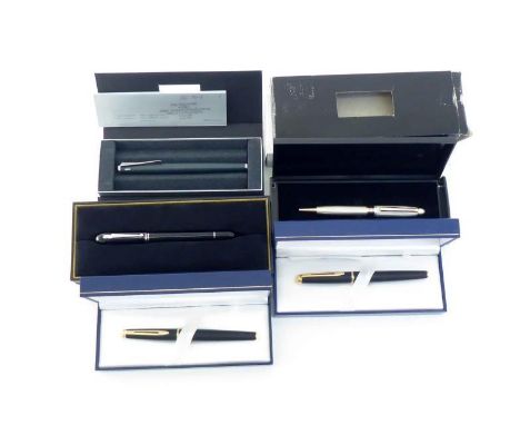 A mixed lot of writing equipment, including a Lamy fountain pen, a Cabouchon roller ball, a Waterman 'Herald Tribune' fountai