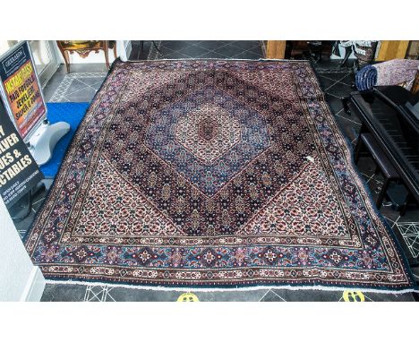 A Genuine Excellent Quality Iranian  Carpet/Rug decorated in a bespoke floral design on a beige ground. As new condition. Mea