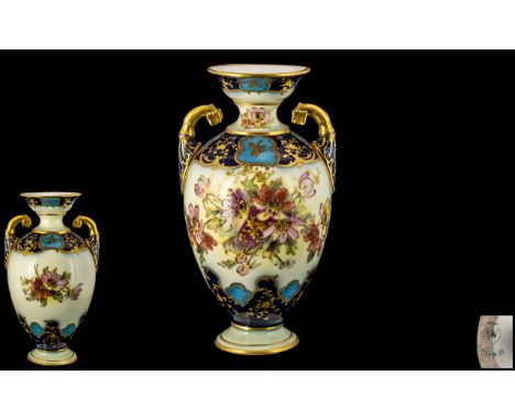 Rudolstadt Straus and Son Superb Quality Hand Painted Twin Handle Vase. c.1900. Decorated In Painted Enamel Floral Images to 