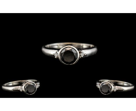 Ladies - Attractive and Contemporary 9ct White Gold Black Diamond Set Ring - Flower head Setting. The Round Faceted Black Dia