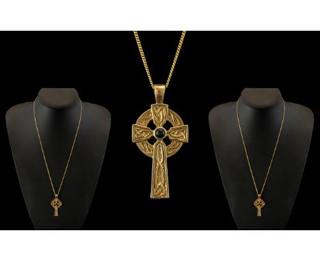 A 9ct Gold Stylished Celtic Cross with Sapphire Inset Attached to a Long 9ct Gold Chain. Both Celtic Cross and Chain Marked f