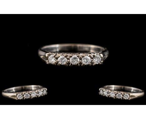 14ct White Gold Attractive 5 Stone Diamond Set Ring. Marked 14ct to Interior of Shank. The Round Brilliant Cut Diamonds of Go