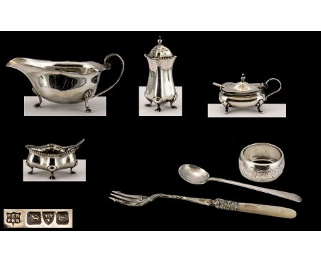 A Collection of Early 1920's Sterling Silver Items ( 7 ) Items In Total. Comprises 1/ Silver Sauce Boat. Hallmark Birmingham 