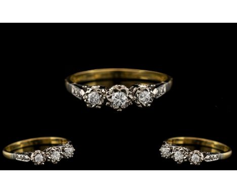 18ct Gold - Attractive 3 Stone Diamond Set Ring - Illusion Set. The Brilliant Cut Diamonds of Good Colour and Clarity. Marked