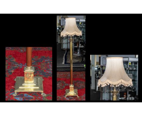 Brass Corinthian Column Standard Lamp with extension on a square step base terminating in poor feet with shade. Overall heigh